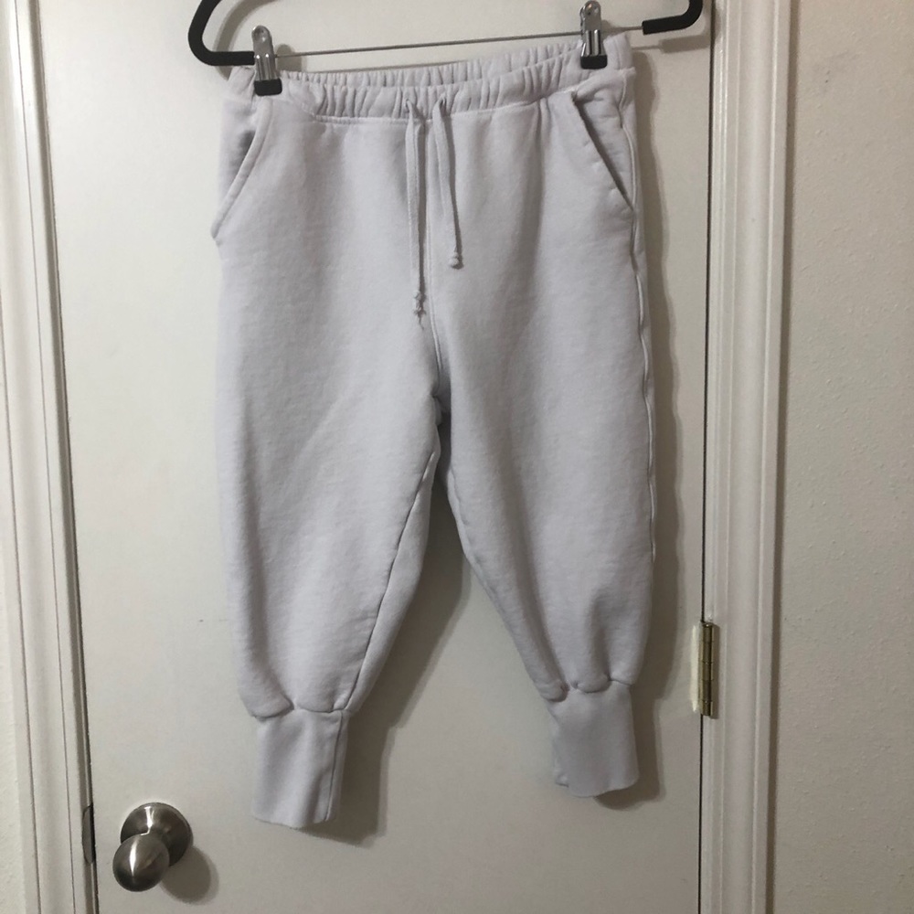 Sweat shorts a bit lower than the knee